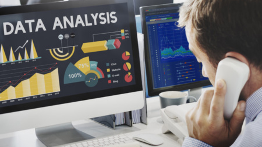 Data Analysis Chart and Person Speaking on Phone