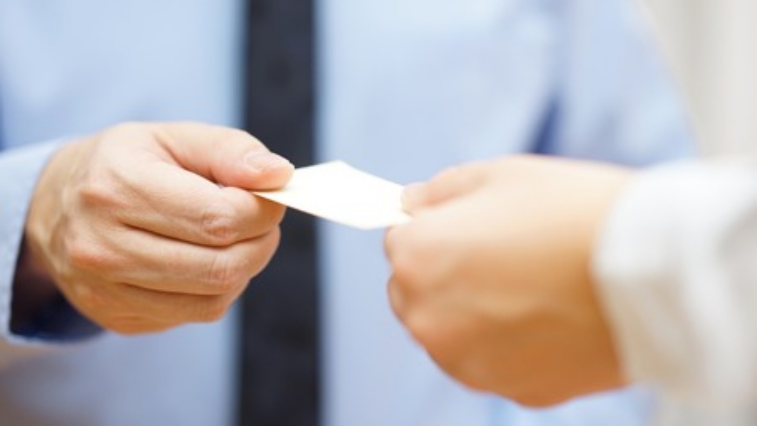 Business People Exchanging Business Cards